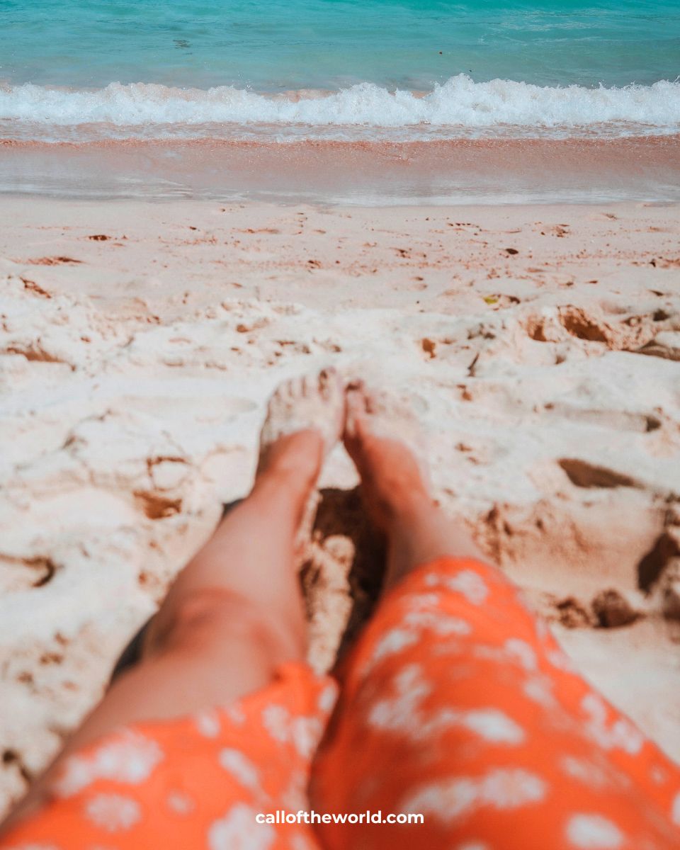 How to Visit Komodo National Park and Padar Island, Indonesia. Feet at the beach.